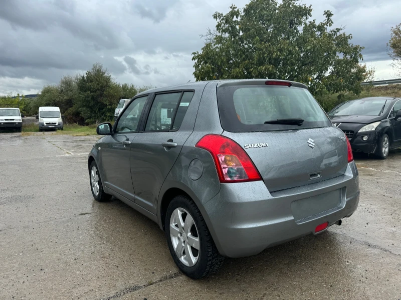 Suzuki Swift 1.3I face lift, снимка 7 - Автомобили и джипове - 49301829