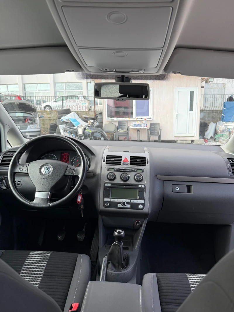 VW Tiguan 1.9 105кс, снимка 12 - Автомобили и джипове - 53342044