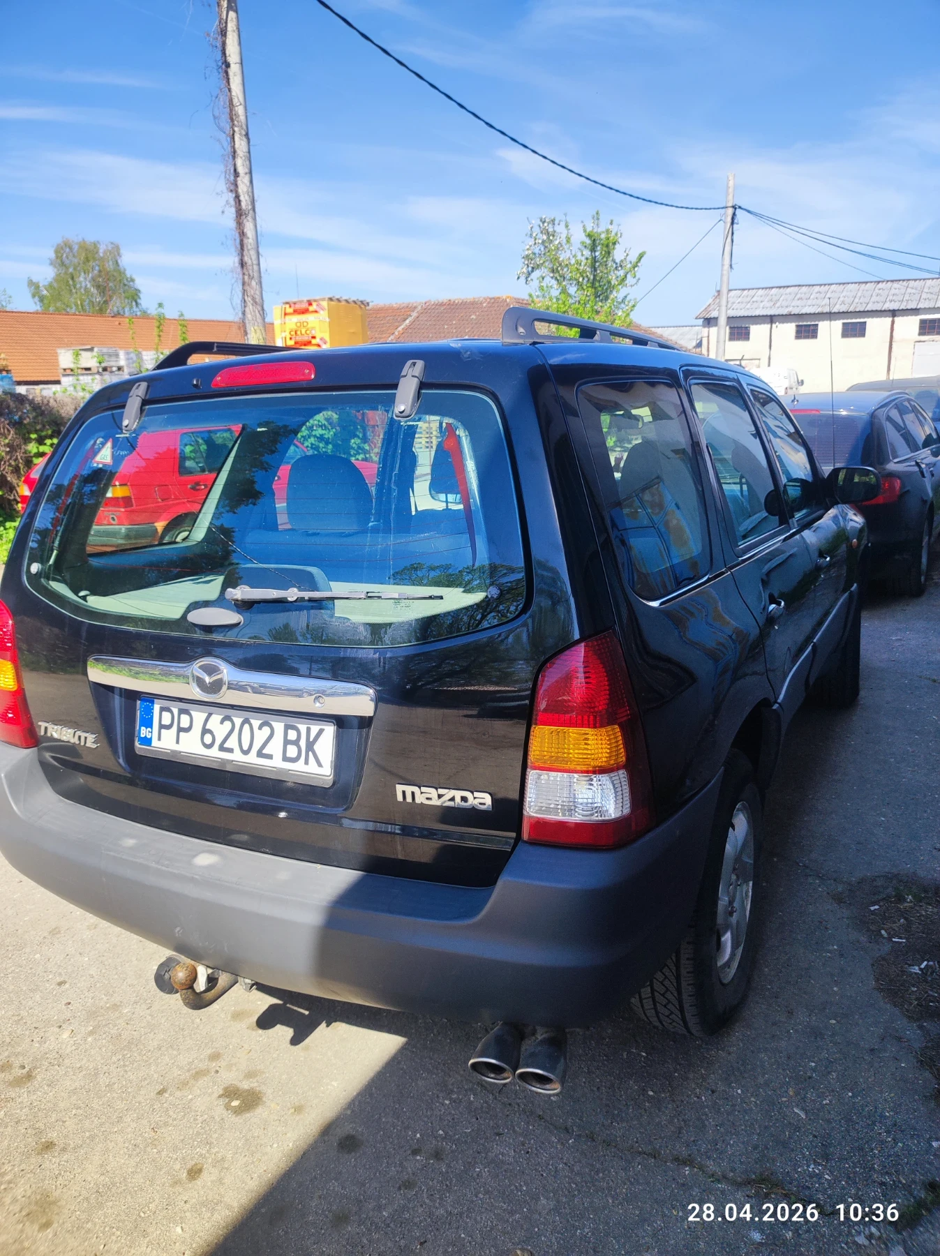 Mazda Tribute, снимка 11 - Автомобили и джипове - 54341249