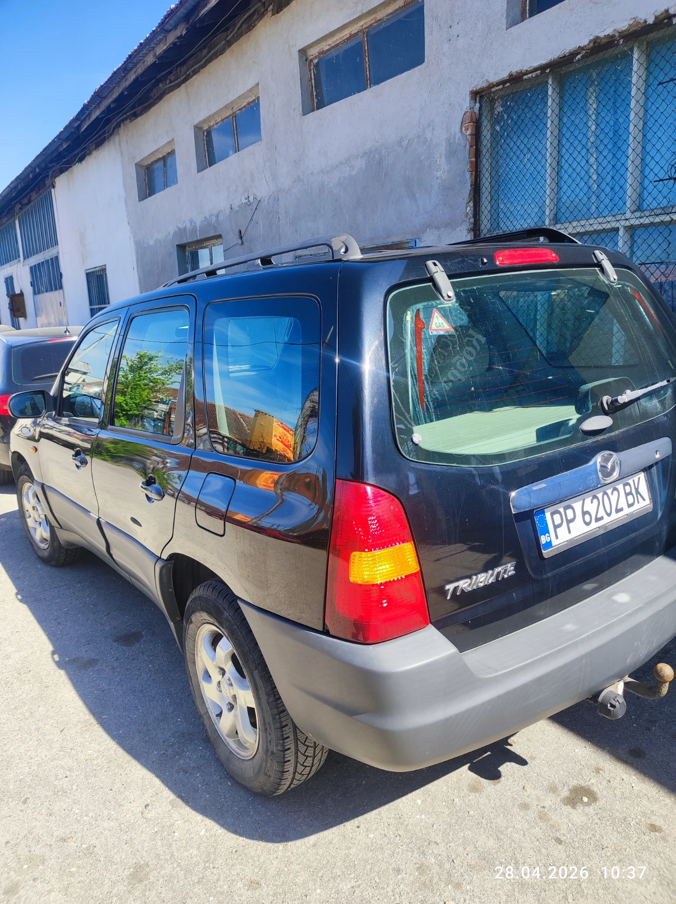 Mazda Tribute, снимка 10 - Автомобили и джипове - 54341249