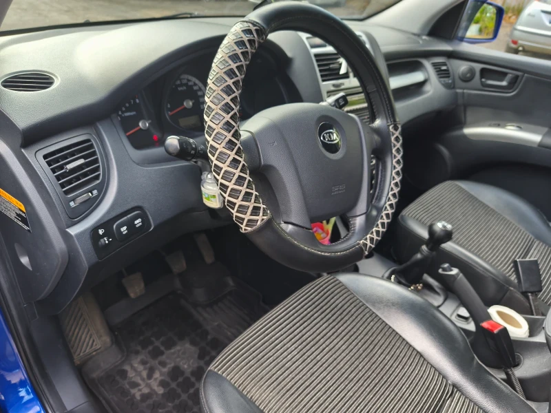 Kia Sportage, снимка 9 - Автомобили и джипове - 52305652