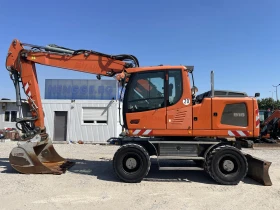 Багер Liebherr A 916