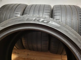 Гуми Летни 305/30R21, снимка 9