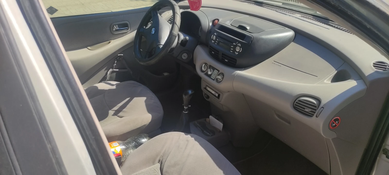 Nissan Almera tino  - изображение 8