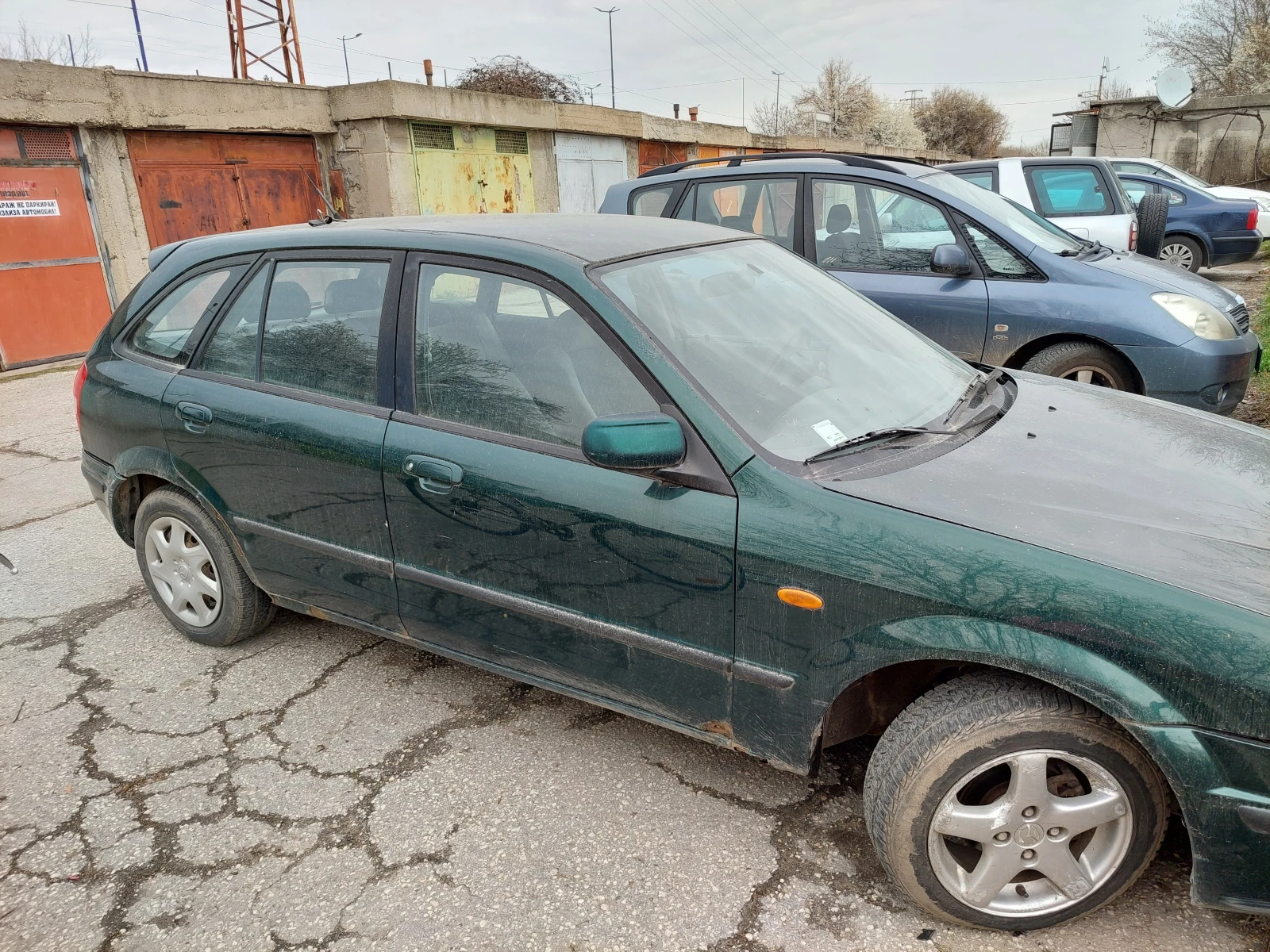 Mazda 323, снимка 16 - Автомобили и джипове - 53910901