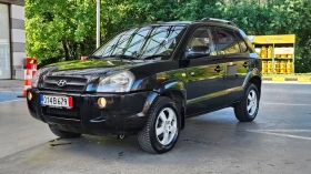 Hyundai Tucson 2.0 Crdi 6skorost/4Wd/Klimatik/Facelift, снимка 2