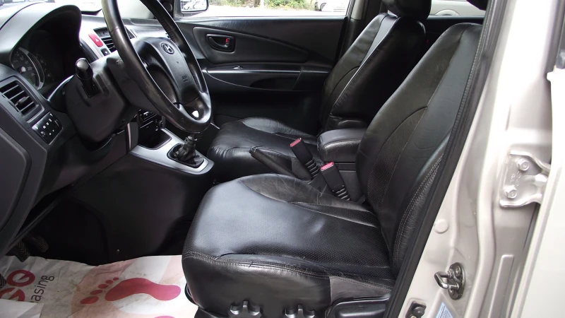 Hyundai Tucson 2.0.d.140.k.c.4x4.КОЖА., снимка 13 - Автомобили и джипове - 52040725