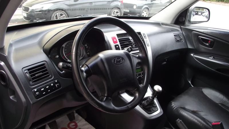 Hyundai Tucson 2.0.d.140.k.c.4x4.КОЖА., снимка 11 - Автомобили и джипове - 52040725