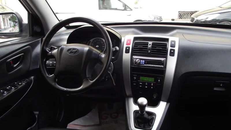 Hyundai Tucson 2.0.d.140.k.c.4x4.КОЖА., снимка 10 - Автомобили и джипове - 52040725