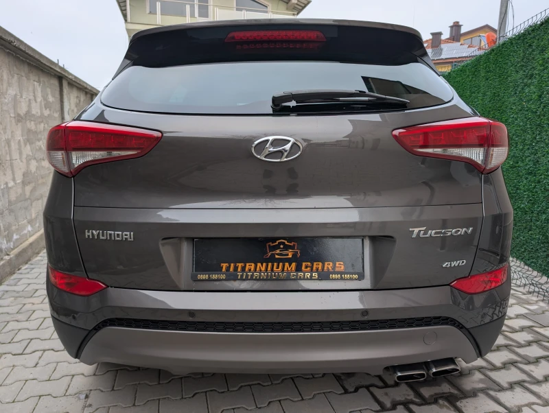 Hyundai Tucson 2.0CRDI* 4x4* Premium* Обдухване* Keyless, снимка 6 - Автомобили и джипове - 52859090