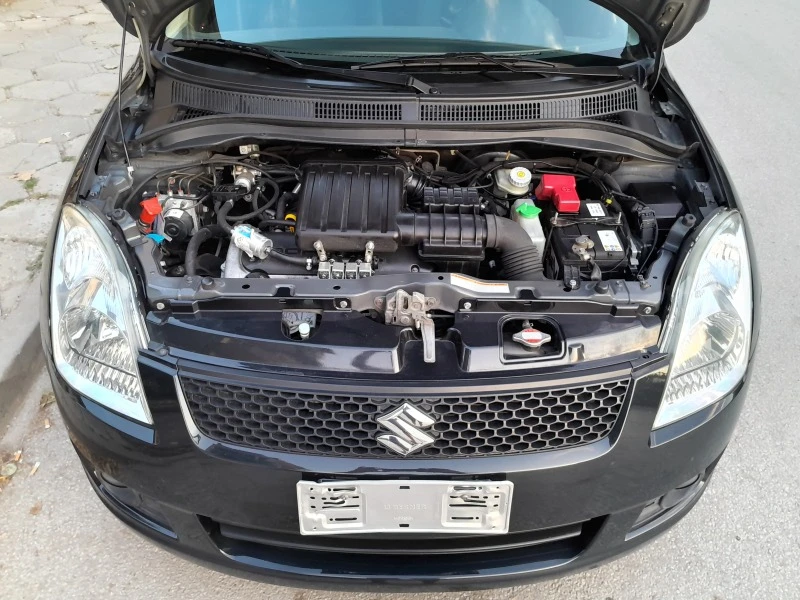 Suzuki Swift 1.3i 4Х4, снимка 8 - Автомобили и джипове - 42380714