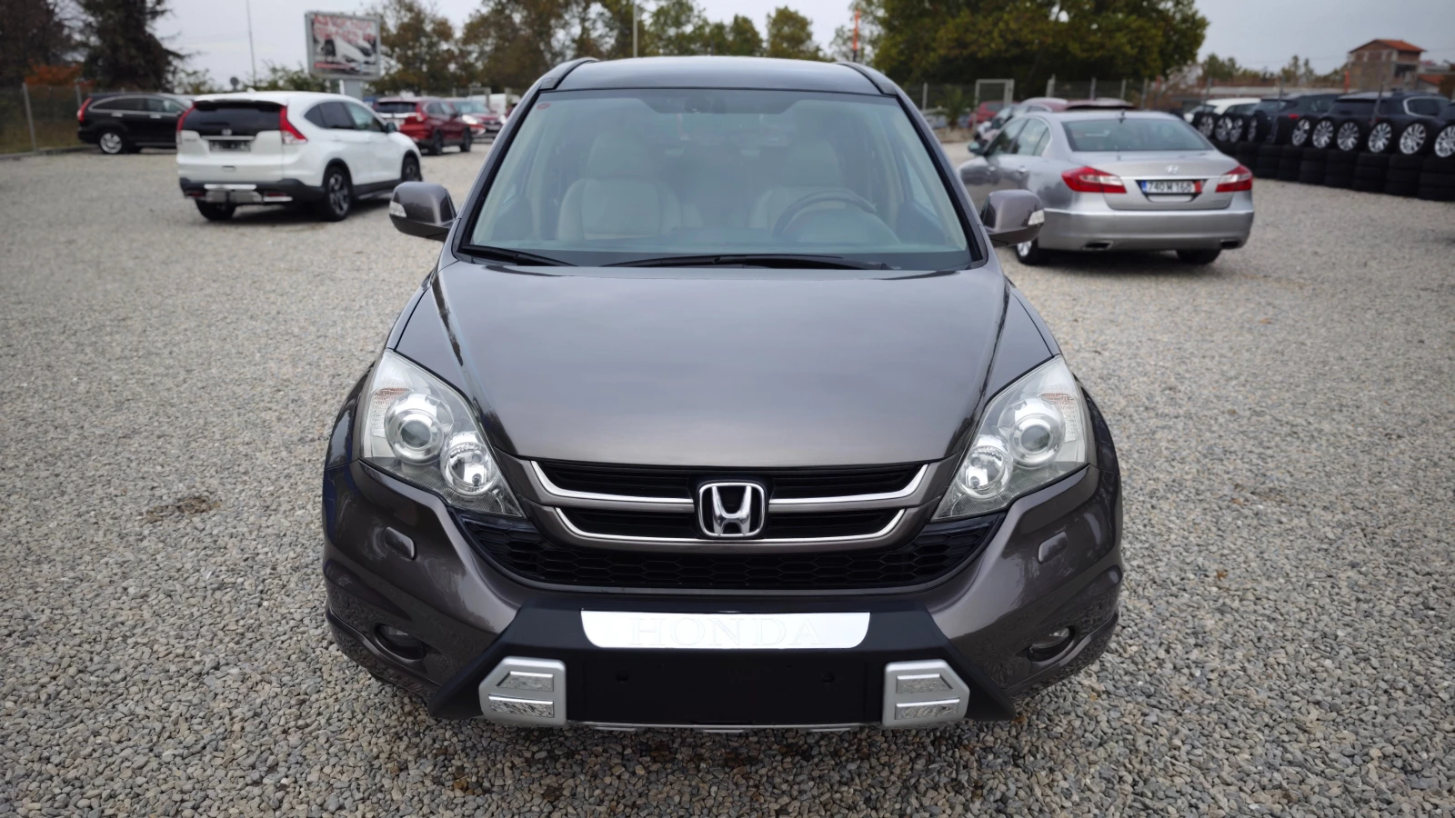 Honda Cr-v EXECUTIVE/AERO/СПОЙЛЕР/СТЕПЕНКИ/РОЛБАР/NAV/DVD/KAM - изображение 4