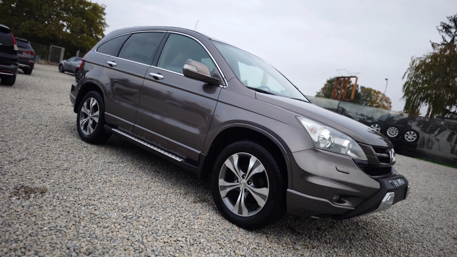Honda Cr-v EXECUTIVE/AERO/СПОЙЛЕР/СТЕПЕНКИ/РОЛБАР/NAV/DVD/KAM - изображение 5