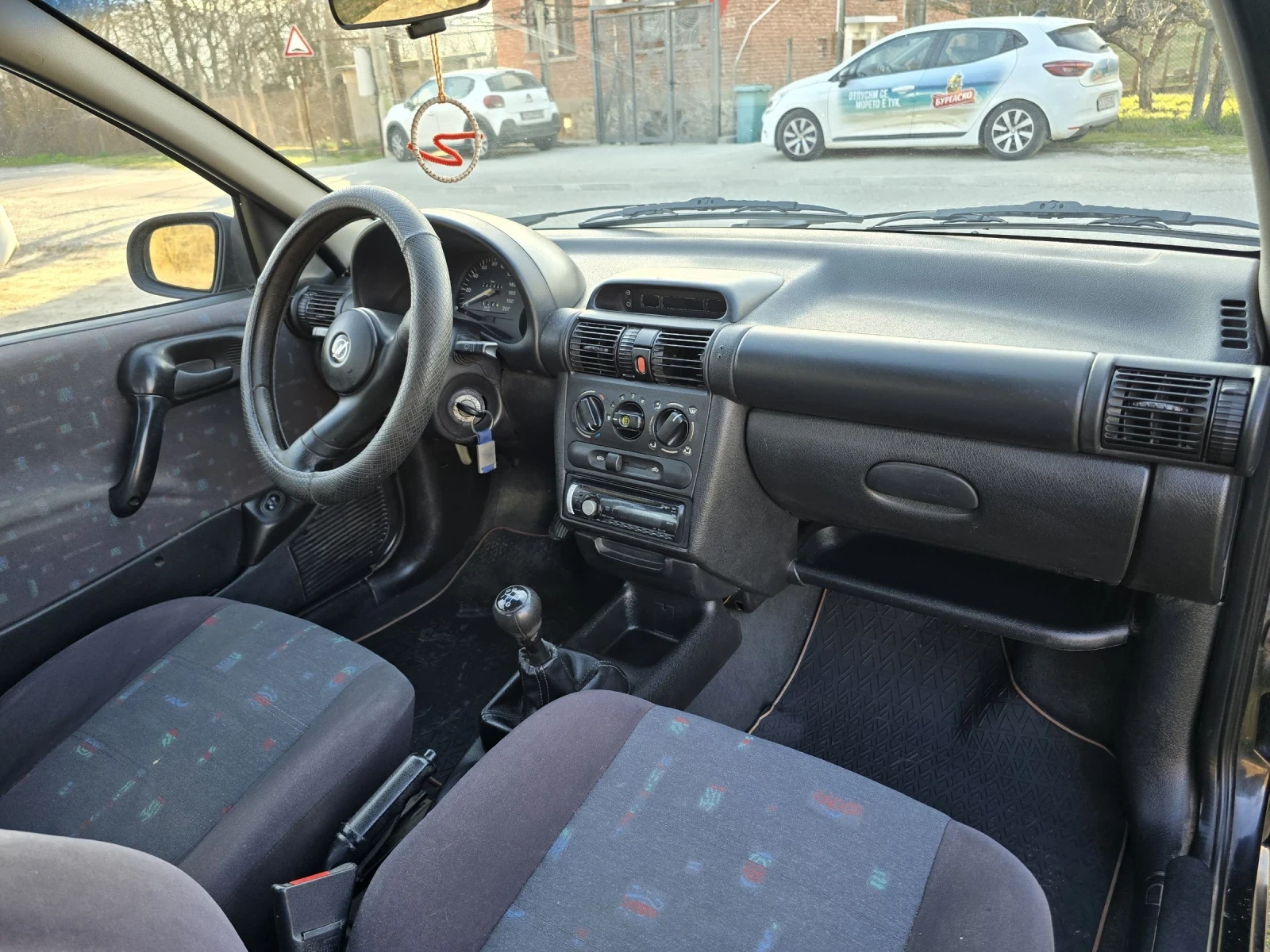 Opel Corsa, снимка 12 - Автомобили и джипове - 53880590