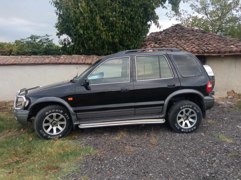 Kia Sportage, снимка 2 - Автомобили и джипове - 47068264