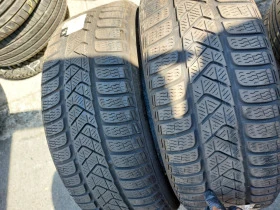 Гуми Зимни 215/55R17, снимка 1 - Гуми и джанти - 41847749