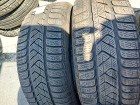 Гуми Зимни 215/55R17, снимка 2 - Гуми и джанти - 41847749