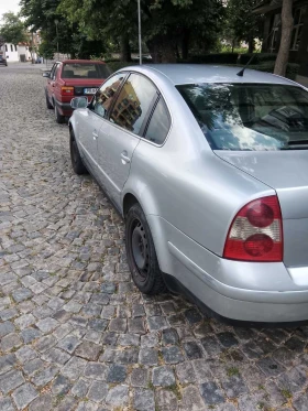 VW Passat 1.9 TDI 101кс. - 2000 € / 3911.66 лв. - 65856621 6