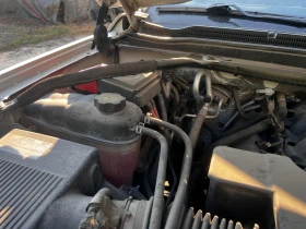 Chevrolet Suburban, снимка 13