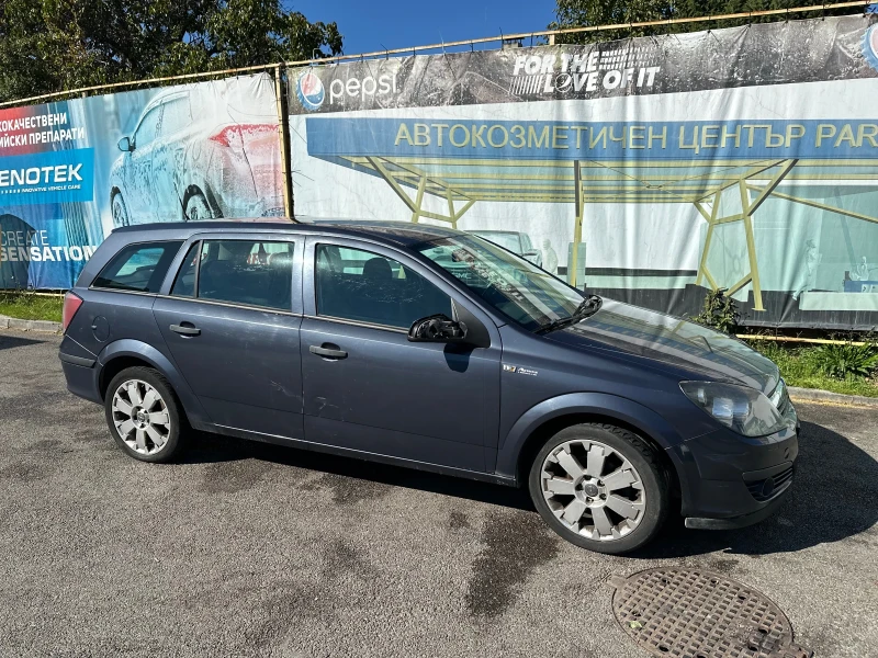 Opel Astra, снимка 7 - Автомобили и джипове - 47665404