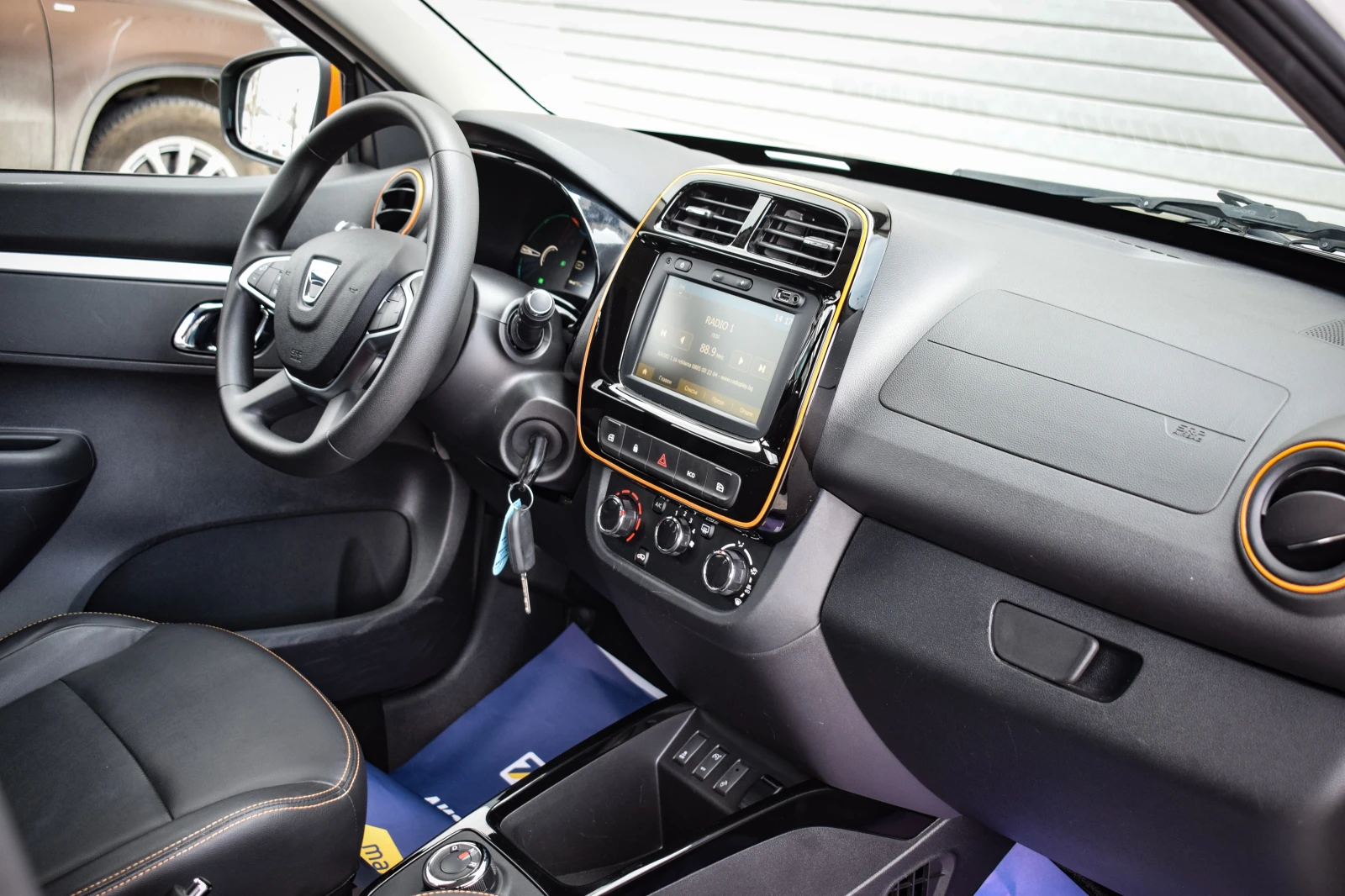 Dacia Spring ELECTIC АВТОМАТИК / КОЖА / КАМЕРА, снимка 12 - Автомобили и джипове - 54010974