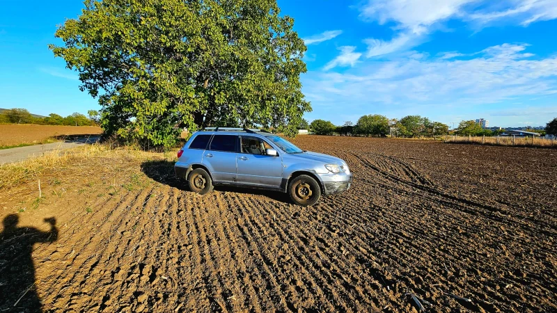 Mitsubishi Outlander 2.0i 16V 4WD, снимка 11 - Автомобили и джипове - 47538073