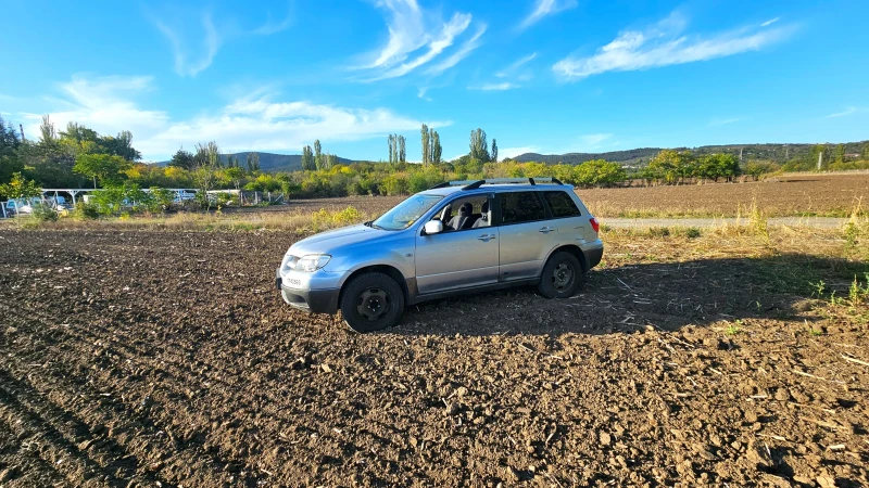 Mitsubishi Outlander 2.0i 16V 4WD, снимка 1 - Автомобили и джипове - 47538073