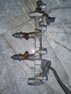 Е7T05072 MR560553 инжекторна дюза MITSUBISHI, снимка 2 - Части - 53525779