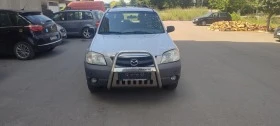 Mazda Tribute 2.0 климатик, снимка 1