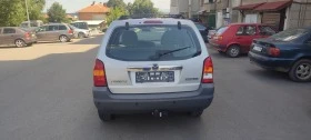 Mazda Tribute 2.0 климатик, снимка 5