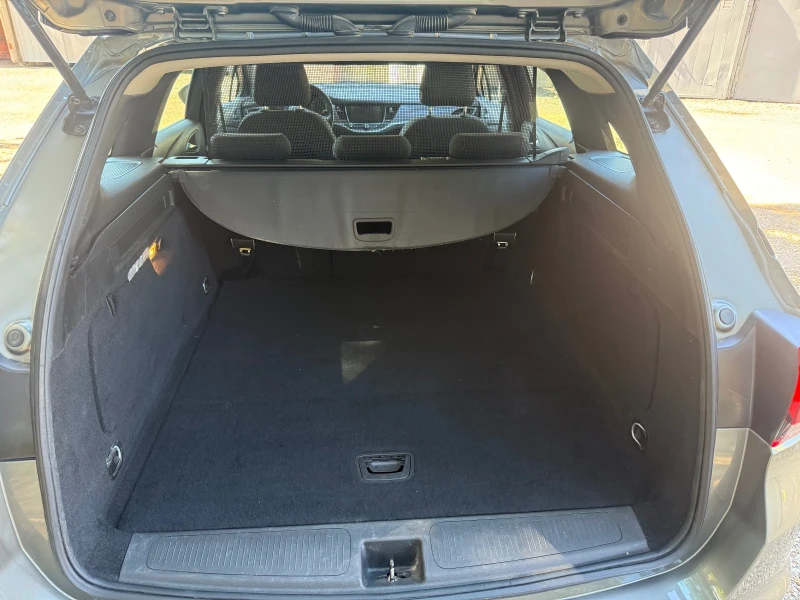 Opel Astra 1.6cdti 110кс, снимка 11 - Автомобили и джипове - 52498661