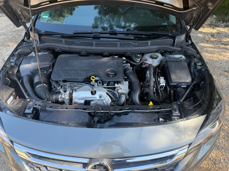 Opel Astra 1.6cdti 110кс, снимка 13 - Автомобили и джипове - 52498661