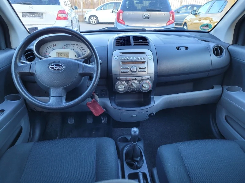 Subaru Justy 1.0 i, снимка 9 - Автомобили и джипове - 43535602