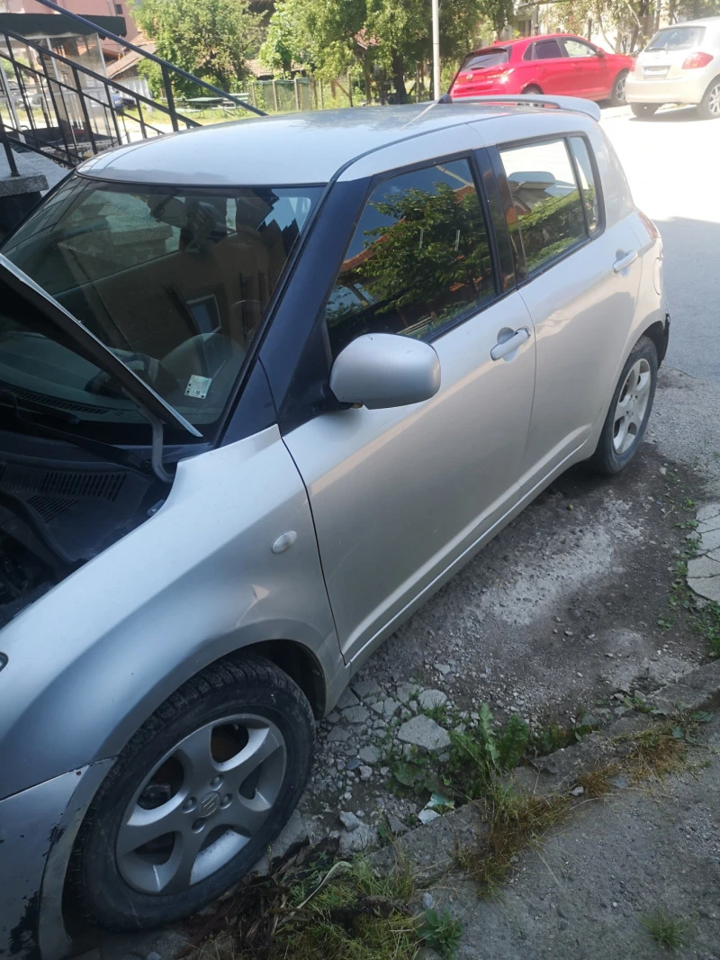 Suzuki Swift 1.3 4x4, снимка 7 - Автомобили и джипове - 48156900