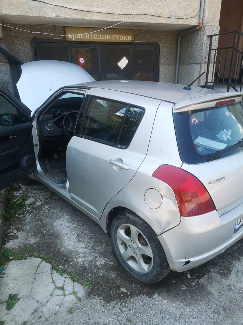 Suzuki Swift 1.3 4x4, снимка 5 - Автомобили и джипове - 48156900