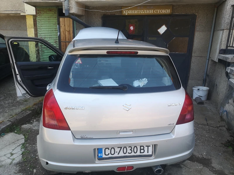 Suzuki Swift 1.3 4x4, снимка 4 - Автомобили и джипове - 48156900