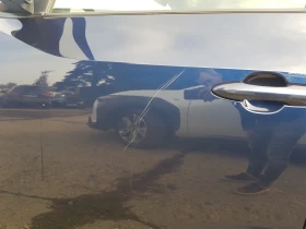 Toyota bZ4X 4х4, снимка 11