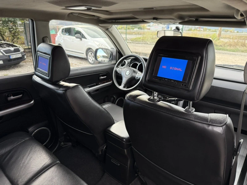 Suzuki Grand vitara 1.9DDiS КОЖА DVD-TV 4x4, снимка 15 - Автомобили и джипове - 51959629