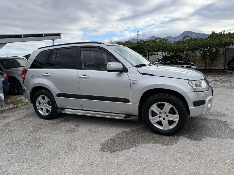 Suzuki Grand vitara 1.9DDiS КОЖА DVD-TV 4x4, снимка 4 - Автомобили и джипове - 51959629