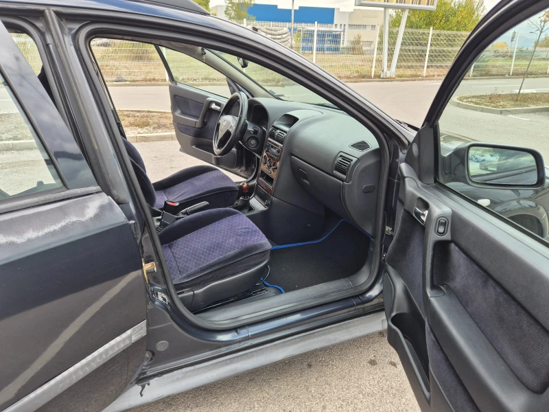 Opel Astra 1.6i Газ, снимка 15 - Автомобили и джипове - 52061644