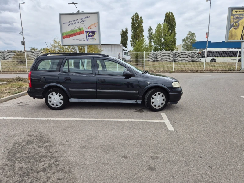 Opel Astra 1.6i Газ, снимка 16 - Автомобили и джипове - 52061644