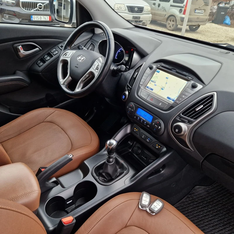 Hyundai IX35 2.0 166k.4Х4 НАВИ/КОЖА/КЕЙЛЕС/FACELIFT ШВЕЙЦАРИЯ , снимка 12 - Автомобили и джипове - 53478166