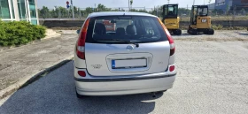 Nissan Almera tino, снимка 9