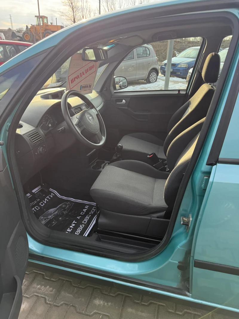 Opel Meriva 1.6* Нов внос* Клима* Реална* Топ* , снимка 11 - Автомобили и джипове - 49281299
