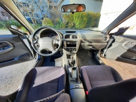 Subaru Impreza 1.6 4х4 газ, снимка 13 - Автомобили и джипове - 44393762