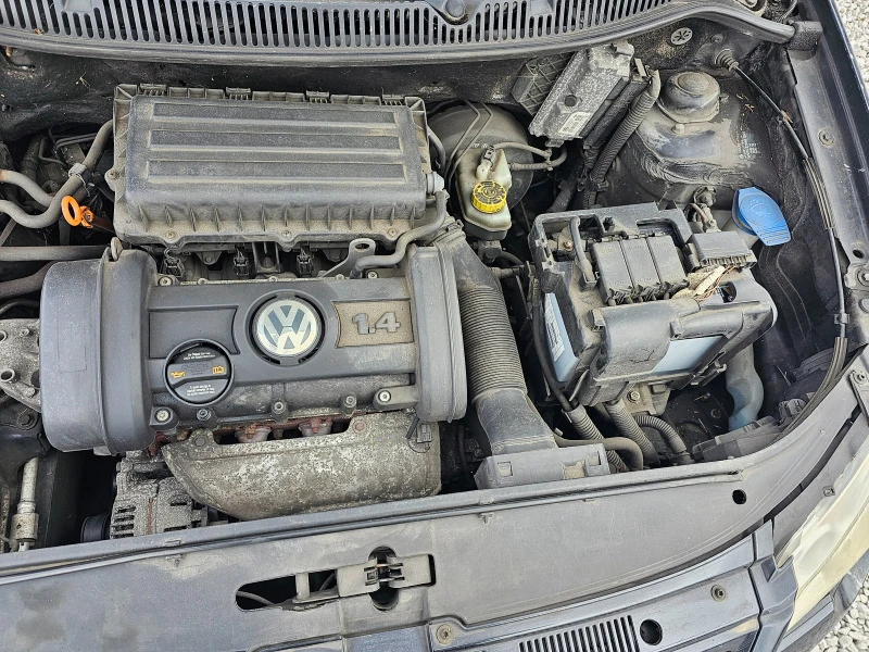 VW Polo 1.4бен., снимка 17 - Автомобили и джипове - 46356142