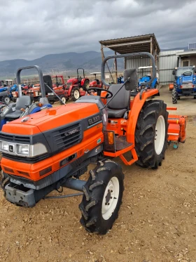 Трактор Kubota скайтрак 