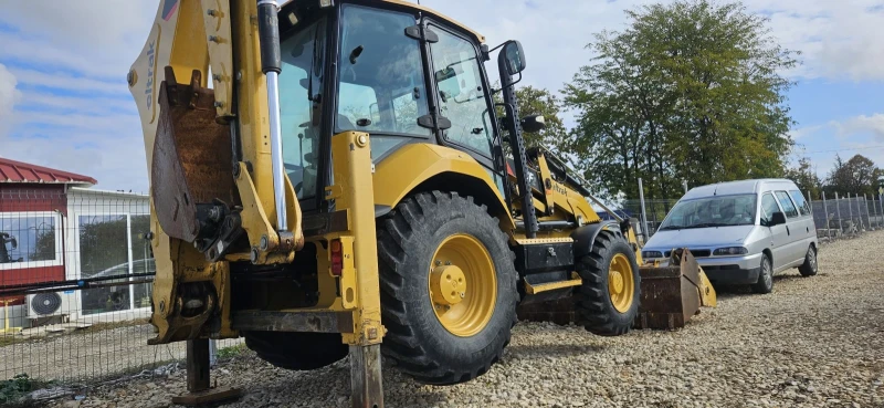 Багер Cat 428F2, снимка 9 - Индустриална техника - 52090498