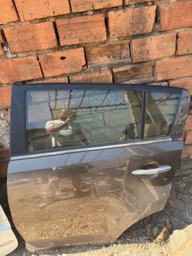 Kia Sportage 2012-205г задна лява врата , снимка 1