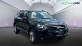     VW Touareg 3.0 TDi 4Motion,    990 .